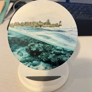 Wireless induction charger for phone